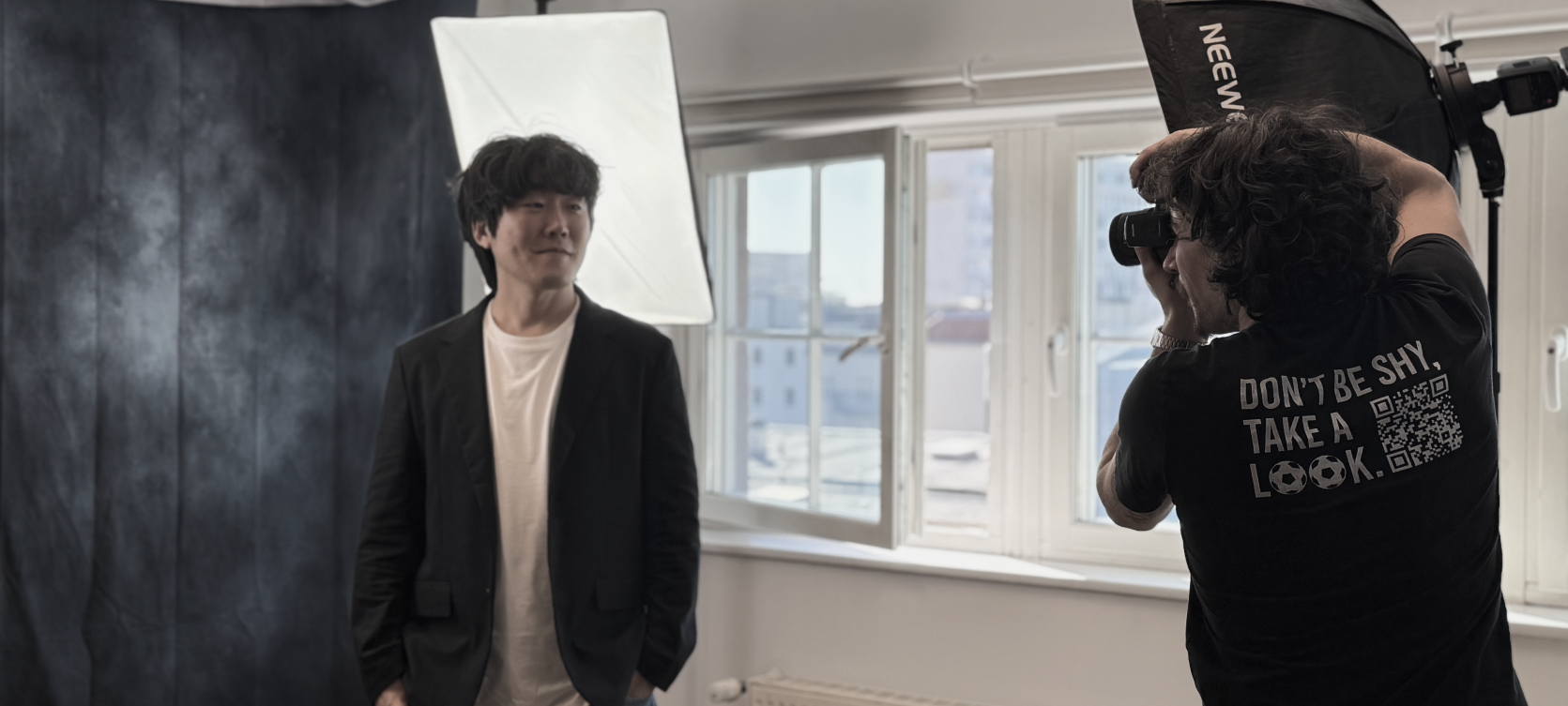 The founder being photographed in a studio for the magazine