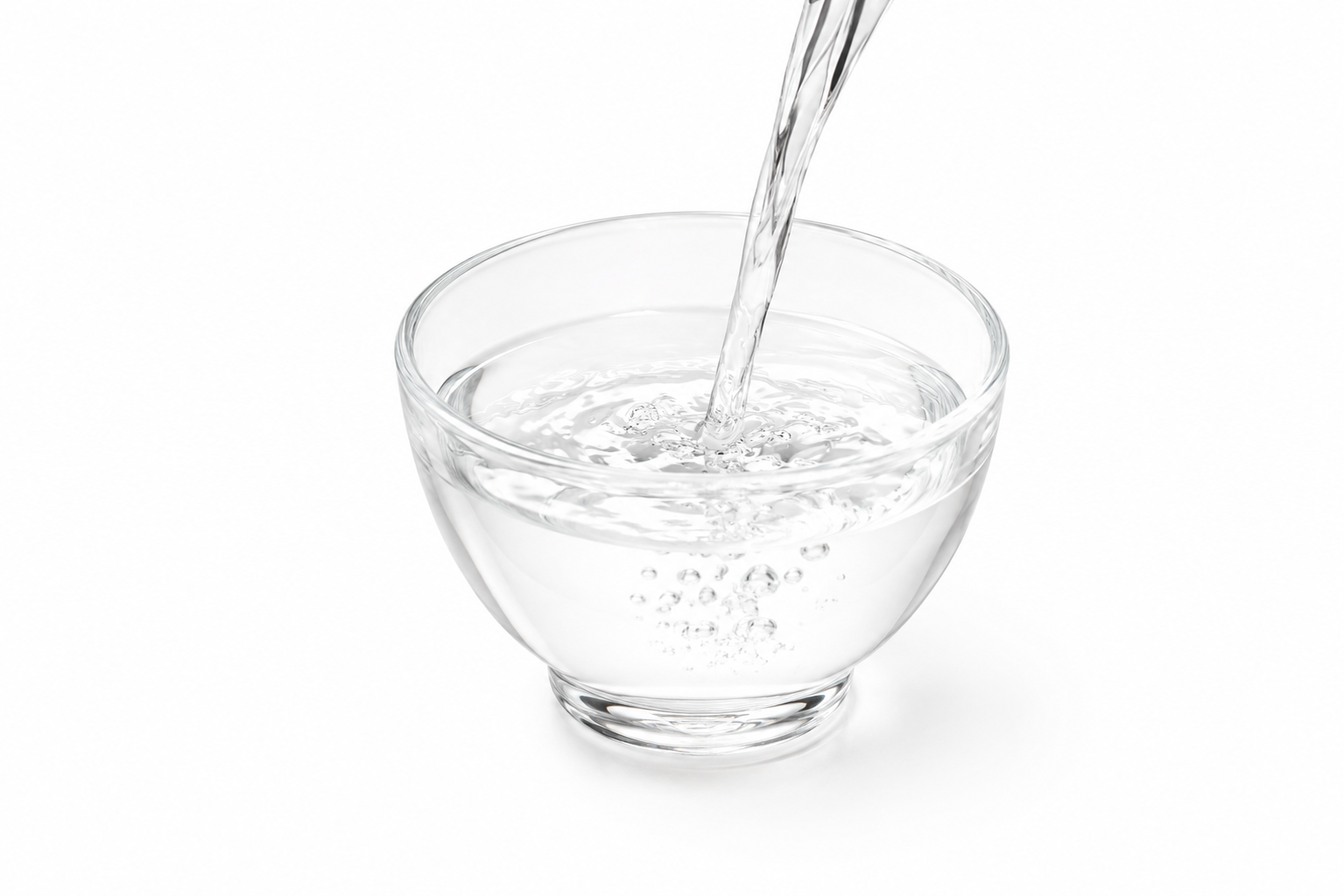 Milky yakju being poured into a ceramic bowl